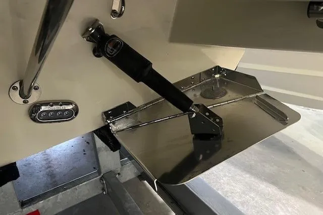 Slide: The Image of 2022 Chris-Craft Launch 25 GT boat trim tab and hydraulic system detail. - 25