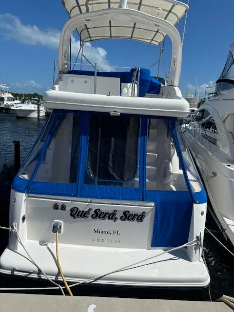 Slide: The Image of 2004 Meridian Sedan Bridge 341 docked in Miami, FL, with blue canopy. - 14