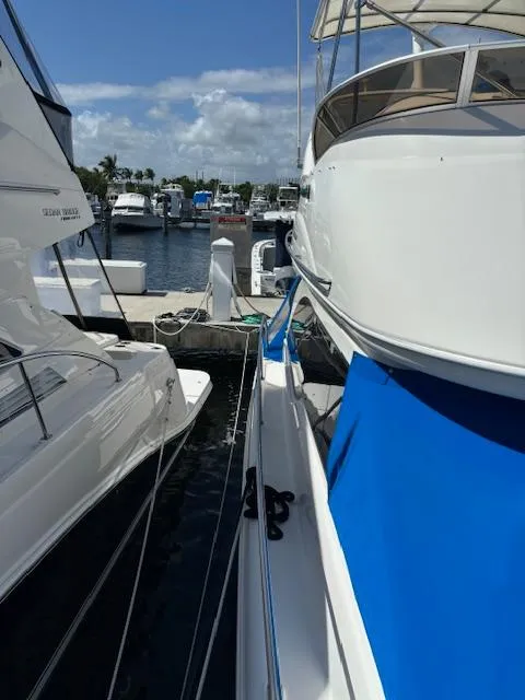 Slide: The Image of 2004 Meridian Sedan Bridge 341 docked at marina, sunny day. - 17