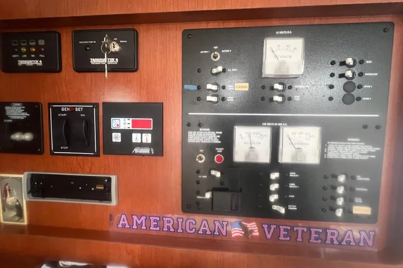 Slide: The Image of Control panel of a 2008 Pro-Line 32 Express boat with "American Veteran" sticker. - 15