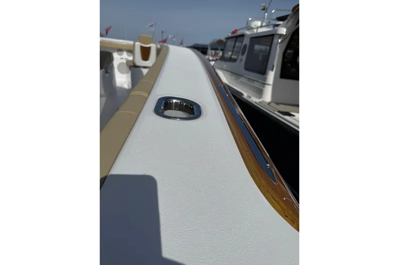 Slide: The Image of 2026 Phenom 37 Center Console boat deck with sleek design and modern features. - 19