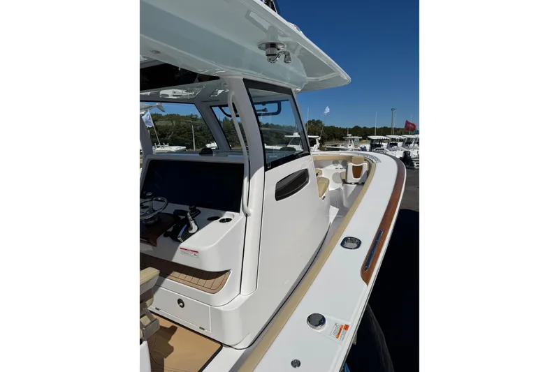 Slide: The Image of 2026 Phenom 37 boat with sleek design and modern cockpit features. - 3