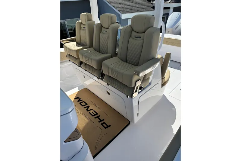Slide: The Image of Luxurious seating on 2026 Phenom 37 boat, featuring premium beige upholstery and sleek design. - 4