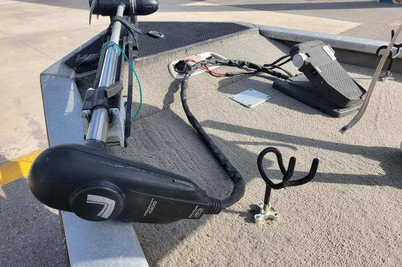 Slide: The Image of 2002 Tracker Pro Team 175 boat deck with trolling motor and foot pedal. - 10