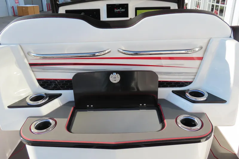 Slide: The Image of 2026 Sunsation 32 CCX boat interior with cup holders and sleek design. - 16