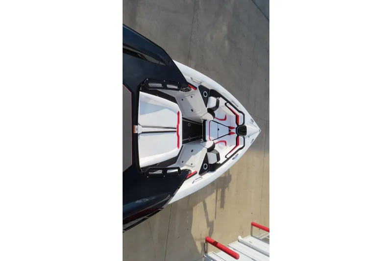 Slide: The Image of 2026 Sunsation 32 CCX boat, aerial view, sleek design with white and black accents. - 18