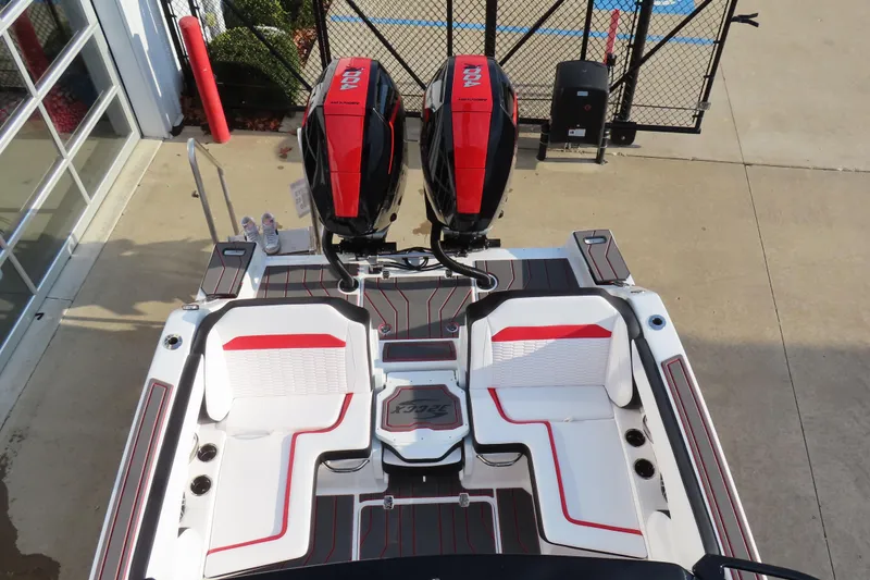 Slide: The Image of 2026 Sunsation 32 CCX boat with dual engines and stylish seating, viewed from above. - 19