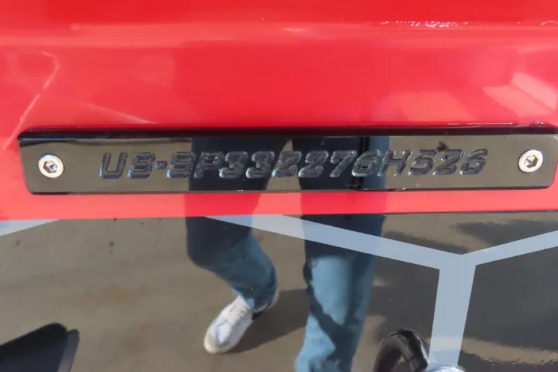 Slide: The Image of 2026 Sunsation 32 CCX boat identification number on red hull. - 21