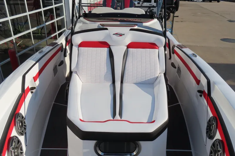 Slide: The Image of 2026 Sunsation 32 CCX boat interior with white and red seating, modern design. - 9