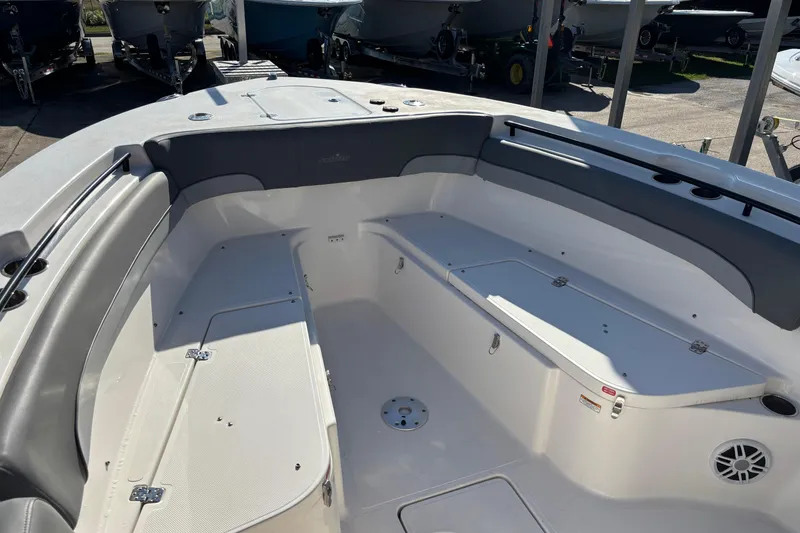 Slide: The Image of 2023 NauticStar 28 XS boat interior with seating and storage compartments. - 6