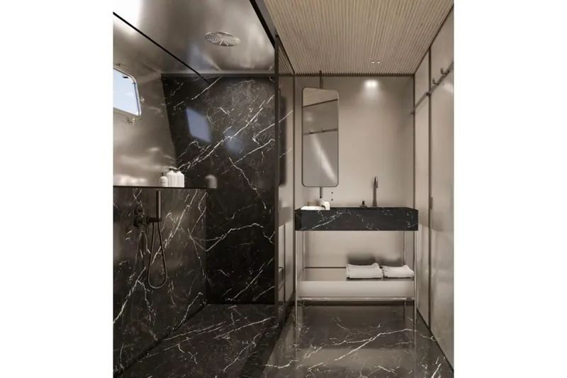 Slide: The Image of Luxurious bathroom in 2027 Sanlorenzo SX120 yacht with sleek black marble design. - 22