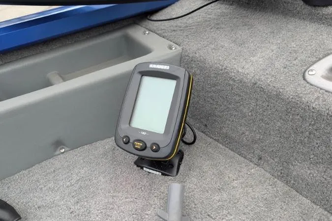 Slide: The Image of Fishfinder on 2011 Bass Tracker PRO TEAM 175 TF boat, gray carpeted interior. - 4