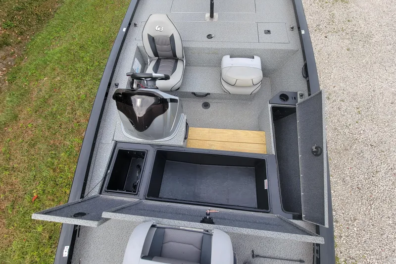 Slide: The Image of 2019 G3 Sportsman 1610 boat interior with seating and storage compartments. - 5