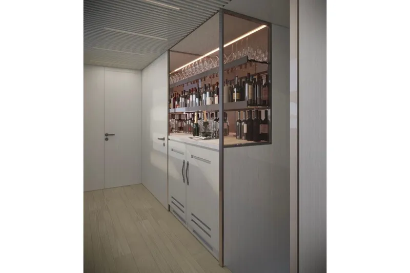 Slide: The Image of Luxurious bar area on 2026 Sanlorenzo SL120A yacht, featuring elegant cabinetry and wine storage. - 8