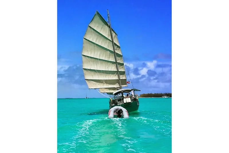 Slide: The Image of Sailing Colvin Gazelle Custom 1974 on turquoise waters under clear blue sky. - 20