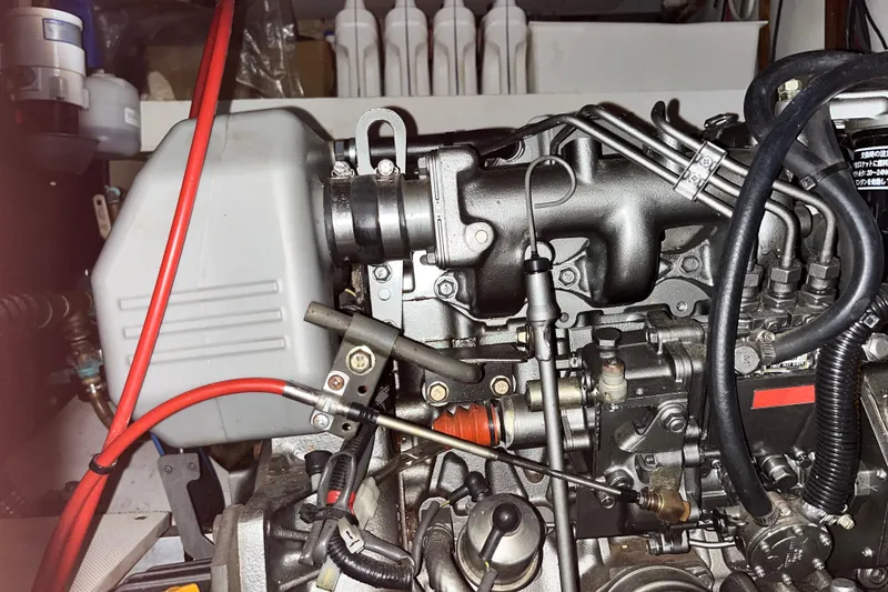 Slide: The Image of Close-up of a 1974 Colvin Gazelle Custom engine with visible components and wiring. - 25