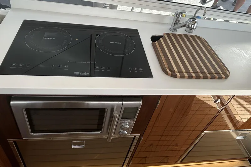 Slide: The Image of Modern kitchen in 2026 MJM 47R yacht with induction cooktop and microwave. - 10