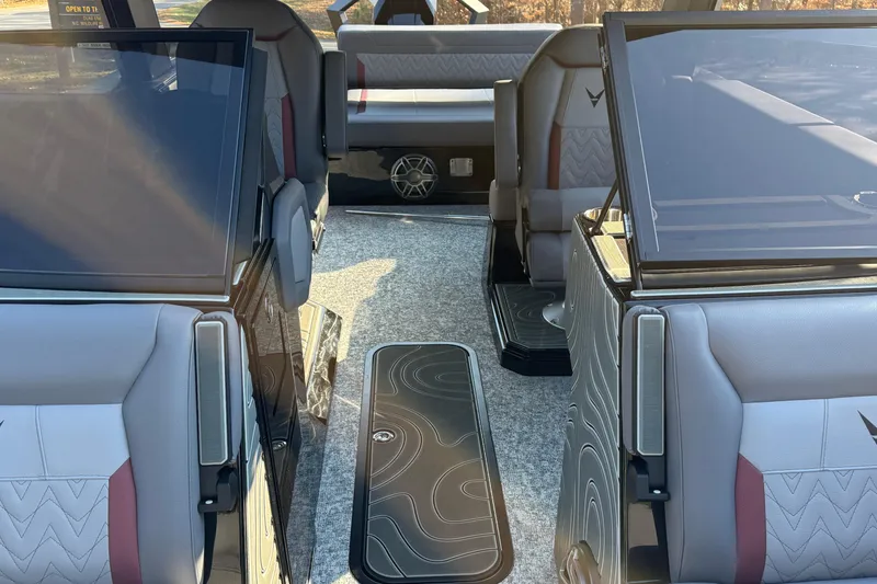 Slide: The Image of 2026 Revel RS25L interior with modern seating and sleek design. - 19