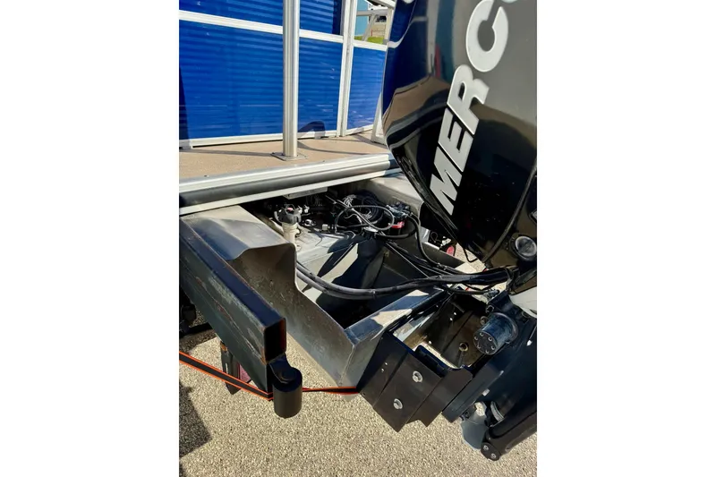 Slide: The Image of 2012 Regency Sun Tracker Party Barge with Mercury outboard motor, close-up view. - 10