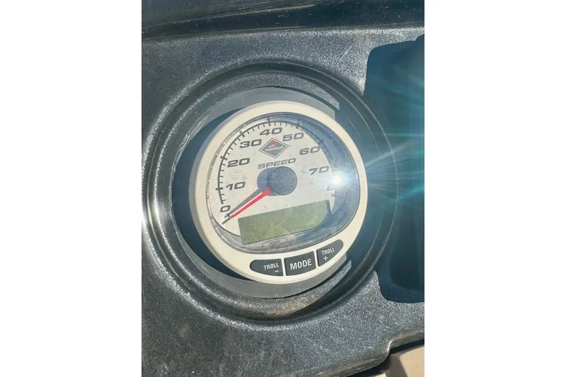 Slide: The Image of 2012 Regency Sun Tracker Party Barge speedometer with sunlight reflection. - 23