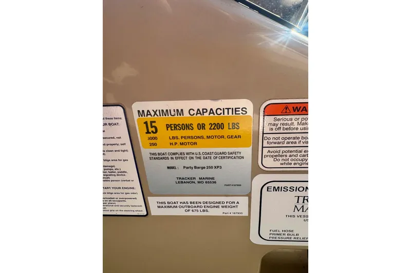 Slide: The Image of 2012 Regency Sun Tracker Party Barge capacity label: 15 persons or 2200 lbs, 250 HP motor. - 26