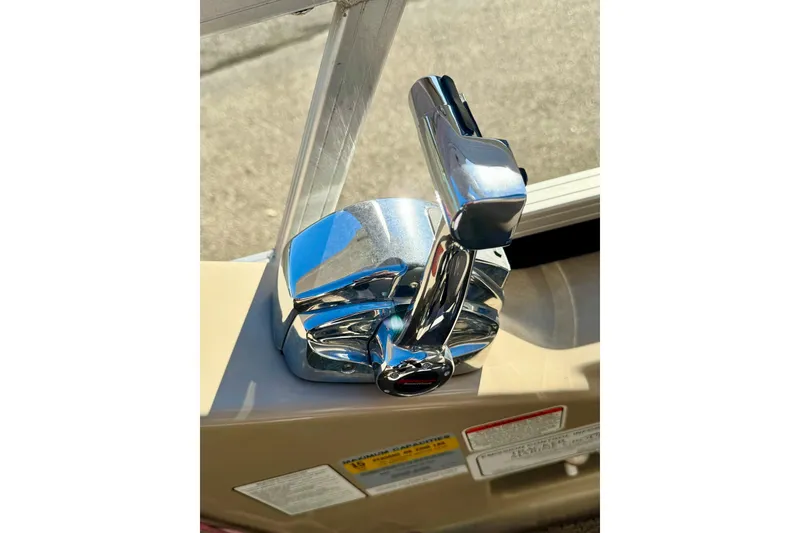 Slide: The Image of Chrome throttle control on 2012 Regency Sun Tracker Party Barge boat. - 27
