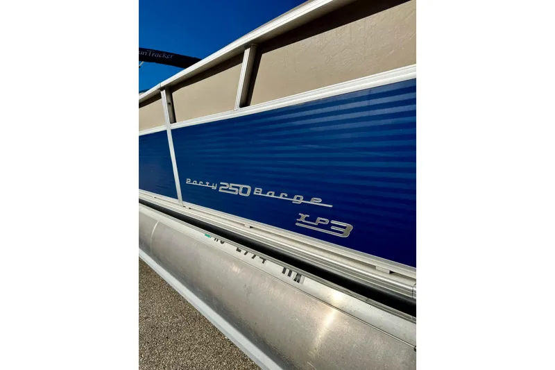 Slide: The Image of 2012 Regency Sun Tracker Party Barge XP3, blue paneling, side view. - 3