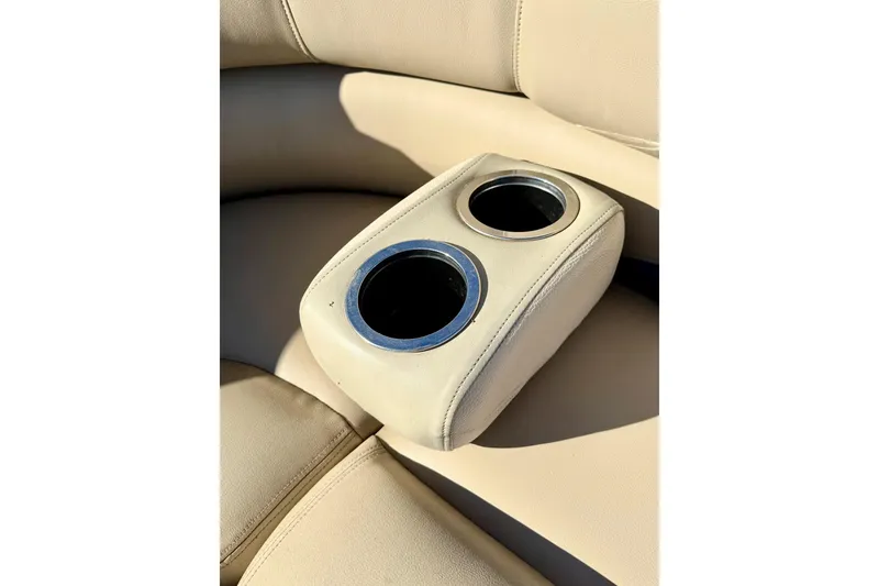 Slide: The Image of Beige leather cup holders on 2012 Regency Sun Tracker Party Barge boat seat. - 30