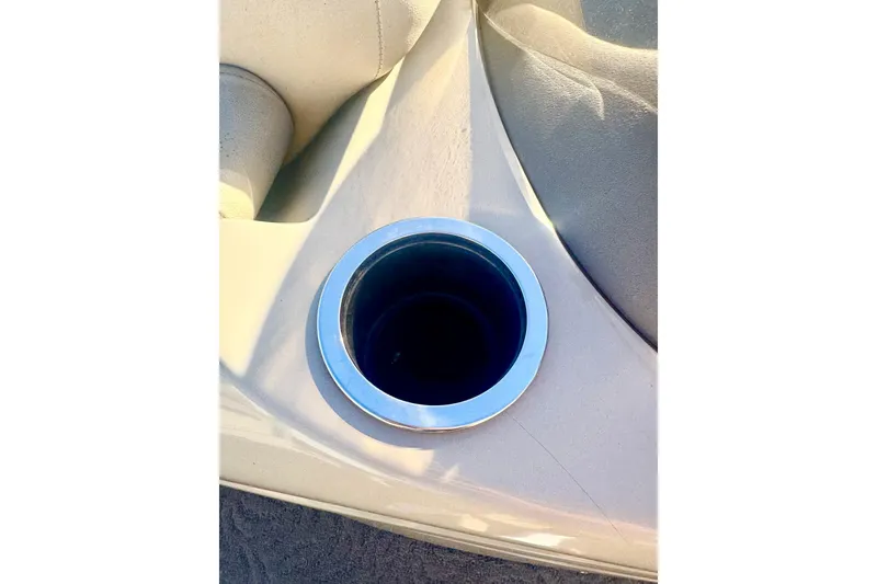 Slide: The Image of Cup holder on 2012 Regency Sun Tracker Party Barge boat interior. - 41