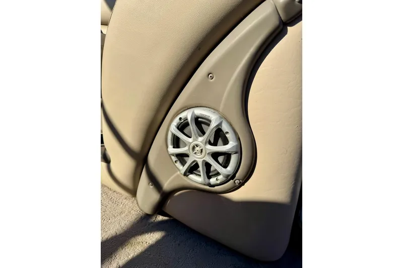 Slide: The Image of Speaker on 2012 Regency Sun Tracker Party Barge, beige interior detail. - 48