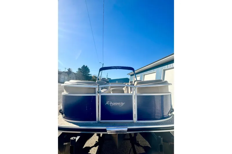 Slide: The Image of 2012 Regency Sun Tracker Party Barge pontoon boat under clear blue sky. - 52