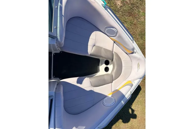 Slide: The Image of 2006 MasterCraft X-9 boat interior with gray and yellow seating. - 4