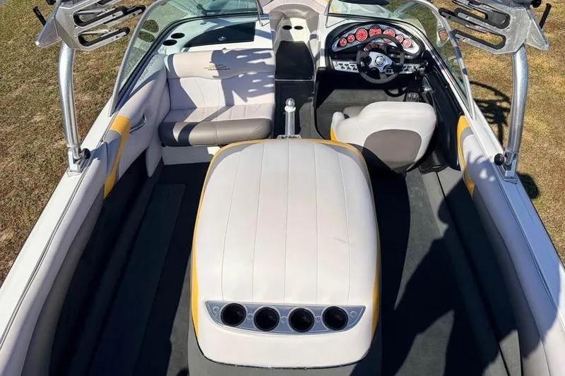 Slide: The Image of 2006 MasterCraft X-9 boat interior with sleek seating and modern dashboard design. - 7