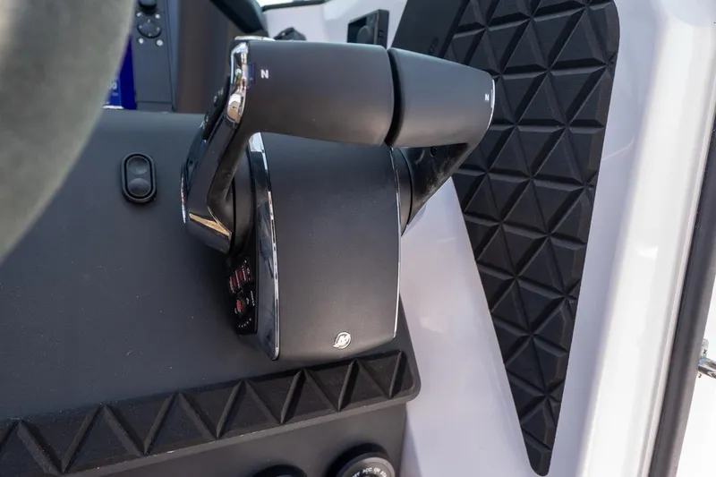 Slide: The Image of Throttle control of 2026 Axopar 37 XC boat, featuring modern design and ergonomic grip. - 46