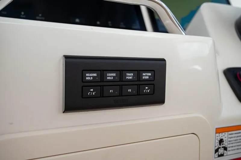 Slide: The Image of Control panel on 2024 Grady-White Freedom 335 boat, featuring navigation buttons. - 28