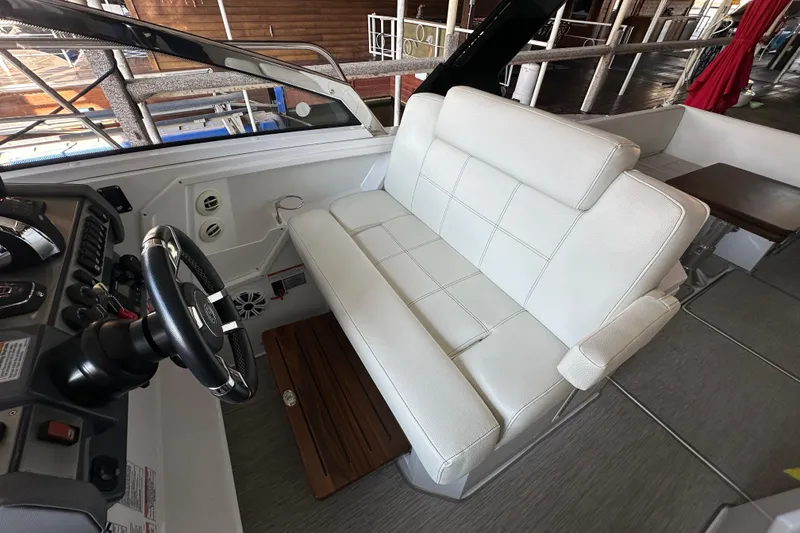 Slide: The Image of 2021 Cruisers Yachts 390 Express Coupe swim platform with "Feelin' Nauti" text. - 26