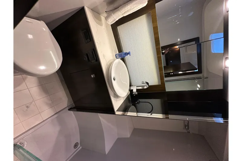 Slide: The Image of Luxurious bathroom interior of 2021 Cruisers Yachts 390 Express Coupe. - 54