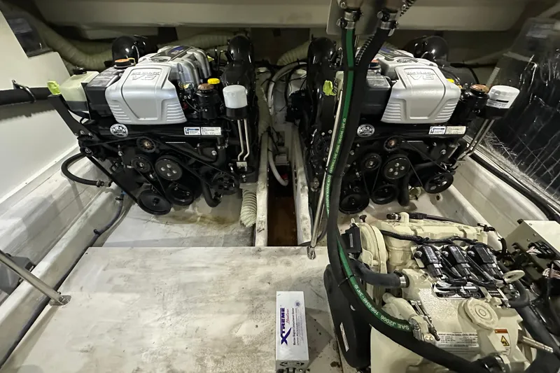 Slide: The Image of Engine room of 2021 Cruisers Yachts 390 Express Coupe with dual engines. - 65