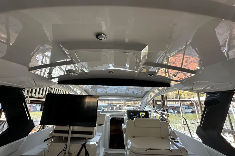 Slide: The Image of 2021 Cruisers Yachts 390 Express Coupe interior with sleek design and modern amenities. - 24