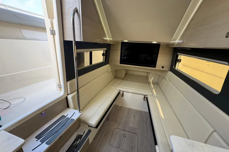 Slide: The Image of Luxurious interior of 2024 Scout 425 LXF boat with comfortable seating and modern amenities. - 40