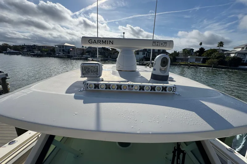Slide: The Image of 2024 Scout 425 LXF boat with Garmin radar and FLIR camera on deck. - 49