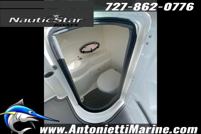 Slide: The Image of 2023 NauticStar 243 DC boat interior with marine toilet, contact Antonietti Marine. - 20