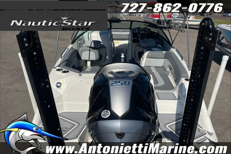 Slide: The Image of 2023 NauticStar 243 DC boat with powerful engine, showcased by Antonietti Marine. - 6