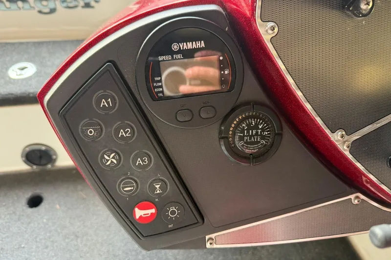 Slide: The Image of Control panel of 2014 Ranger Z520 Comanche boat with Yamaha display and lift plate gauge. - 16