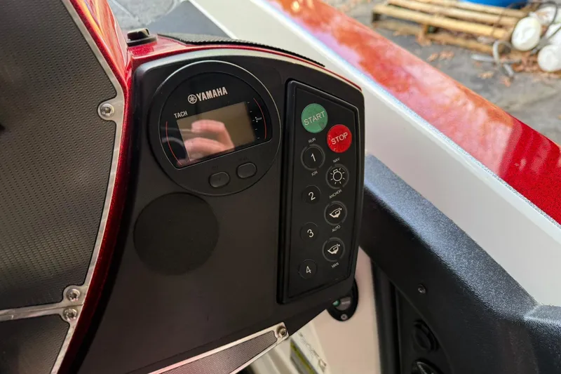 Slide: The Image of Control panel of a 2014 Ranger Z520 Comanche boat with Yamaha tachometer. - 17