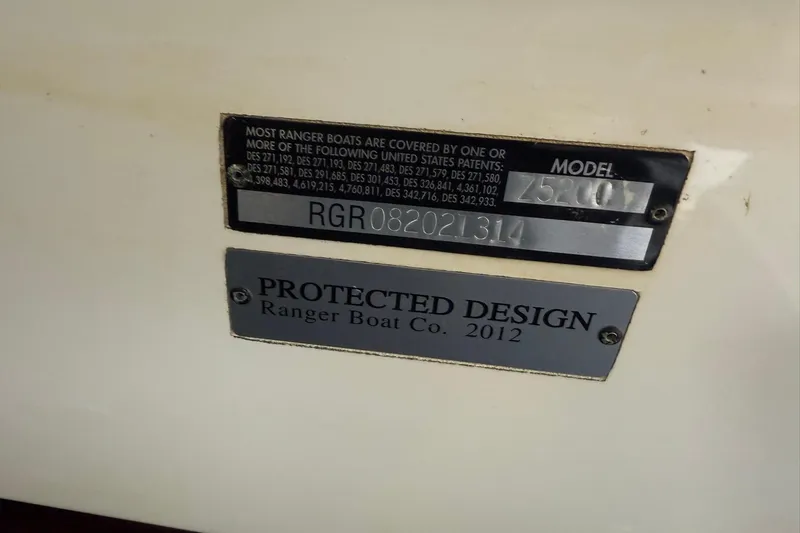 Slide: The Image of 2014 Ranger Z520 Comanche boat model and patent information plates. - 19