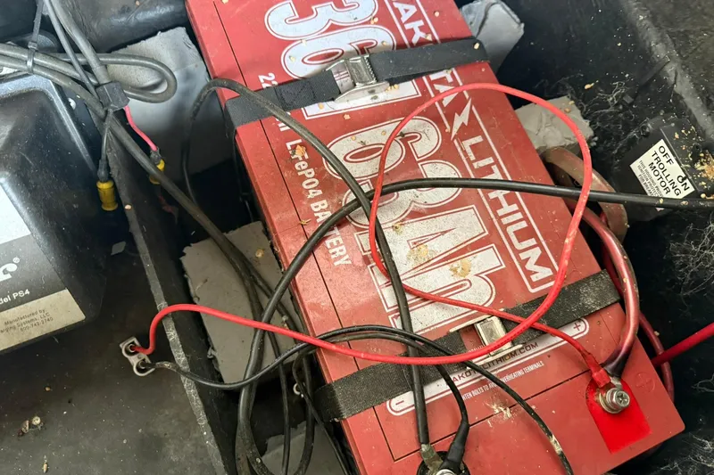 Slide: The Image of 2014 Ranger Z520 Comanche lithium battery setup with visible wiring and connections. - 7