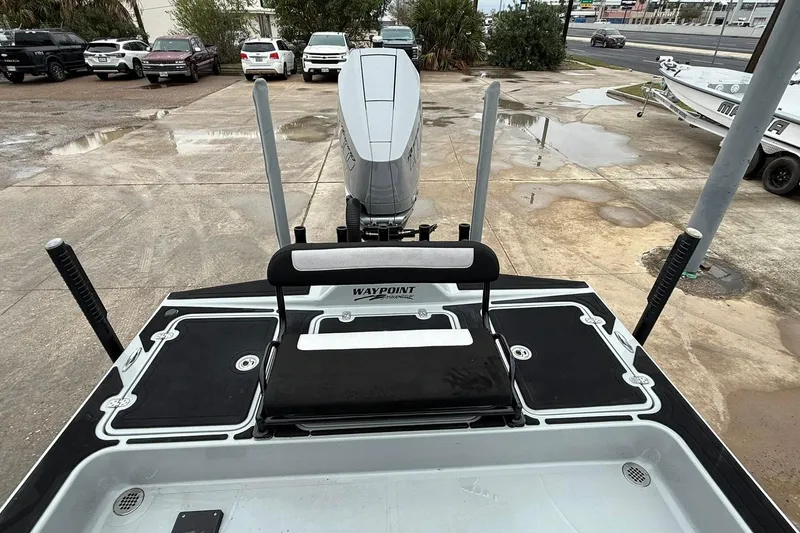 Slide: The Image of 2026 Mamba 24 Cat Elite boat interior with dual seats and steering console. - 15