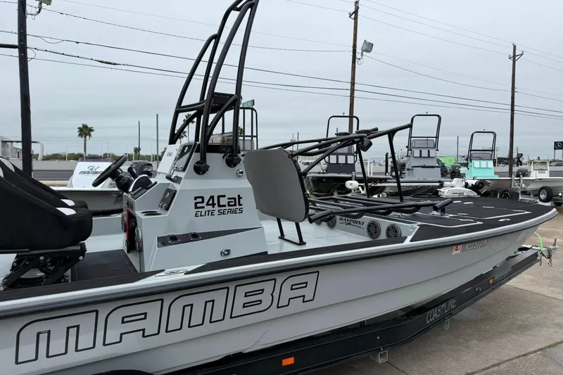 Slide: The Image of 2026 Mamba 24 Cat Elite boat on trailer at marine supercenter. - 22