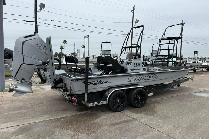 Slide: The Image of 2026 Mamba 24 Cat Elite boat on trailer at dealership. - 4